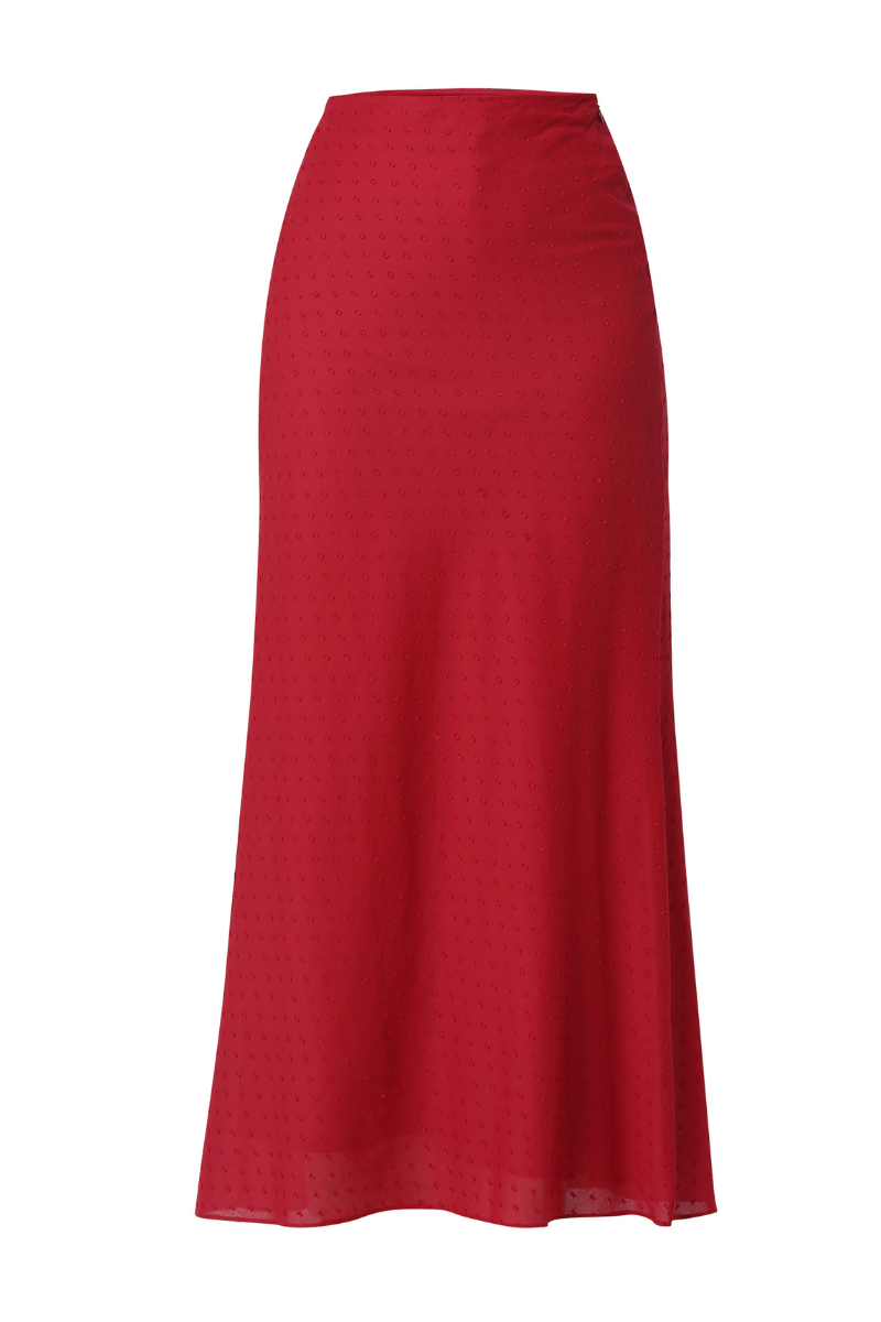 Summer Away Cefalù maxi skirt in cherry with flowing fabric and vibrant color, styled as a casual and elegant summer outfit.