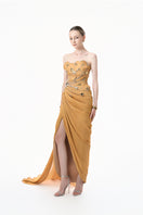 Elegant chartreuse gold heart-embellished draped gown from Happy Clothing, featuring flowing fabric and intricate heart details.