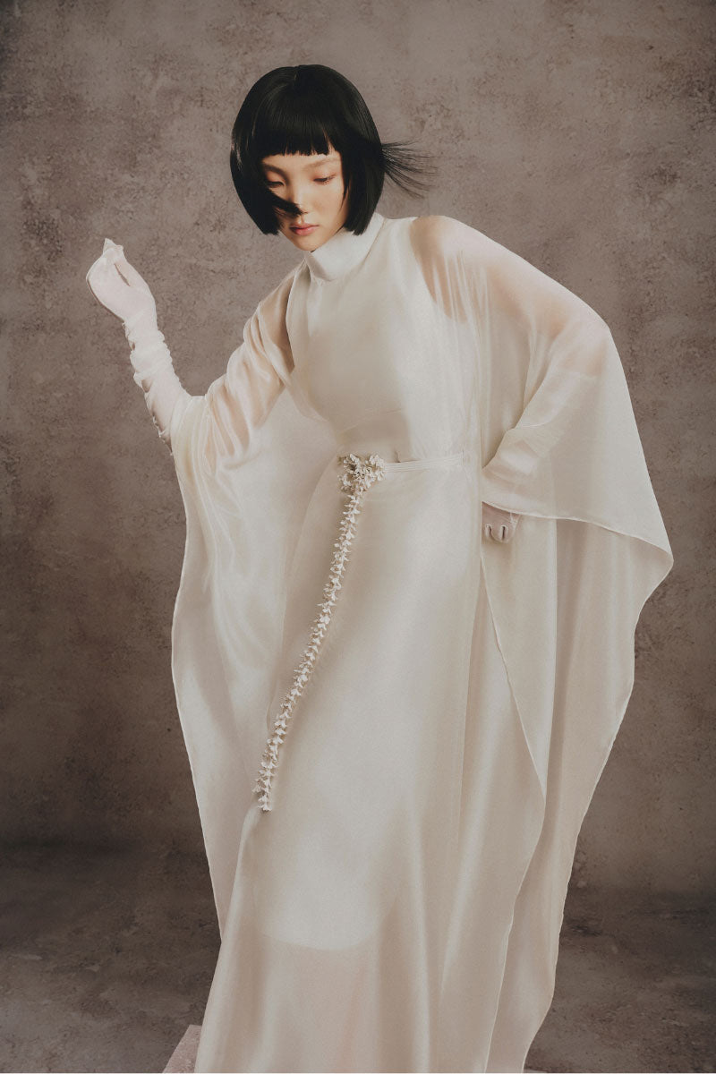 Ivory Serenity kaftan maxi dress by White Plan, flowing lightweight fabric with elegant drape and relaxed fit.