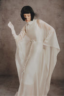 Ivory Serenity maxi kaftan dress by White Plan, flowing and elegant with intricate detailing, perfect for warm-weather wear.