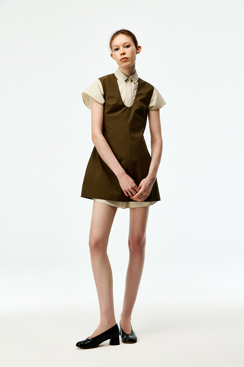 Khaki cotton mini dress by Chictopia, featuring a comfortable fit and stylish design, shown on a model.