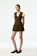 Khaki cotton mini dress by Chictopia featuring a casual fit and sleeveless design, perfect for summer or casual outings.