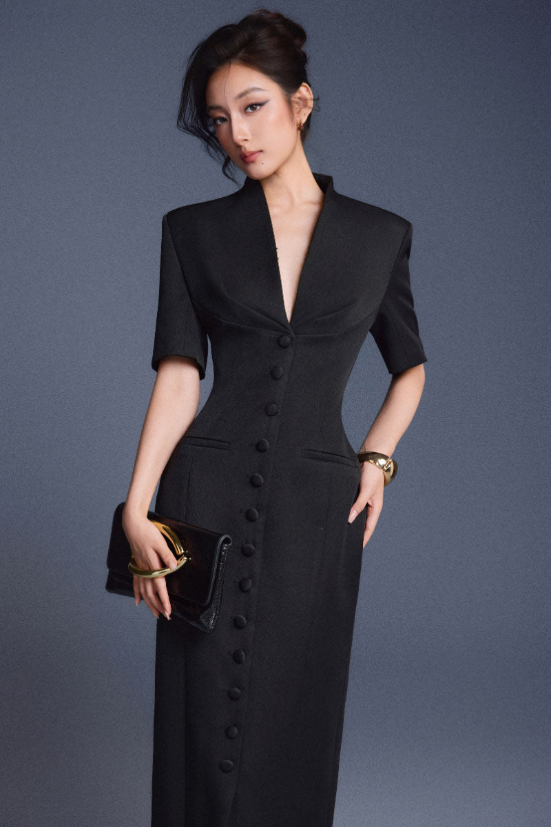Keira Tong zipper peplum maxi dress featuring a fitted bodice, peplum detail, and flowing skirt in elegant fabric.