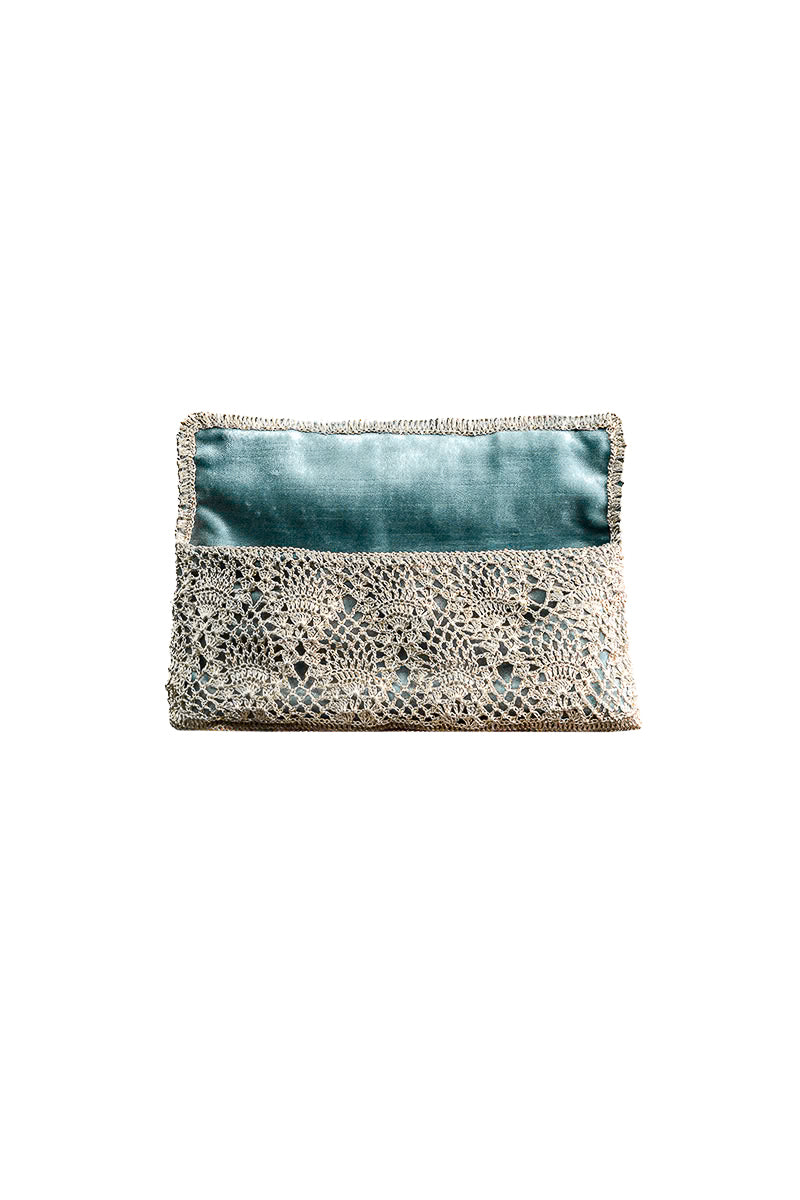 White gold pineapple clutch by VERDI with turquoise accents, featuring a stylish and compact design for elegant evening wear.
