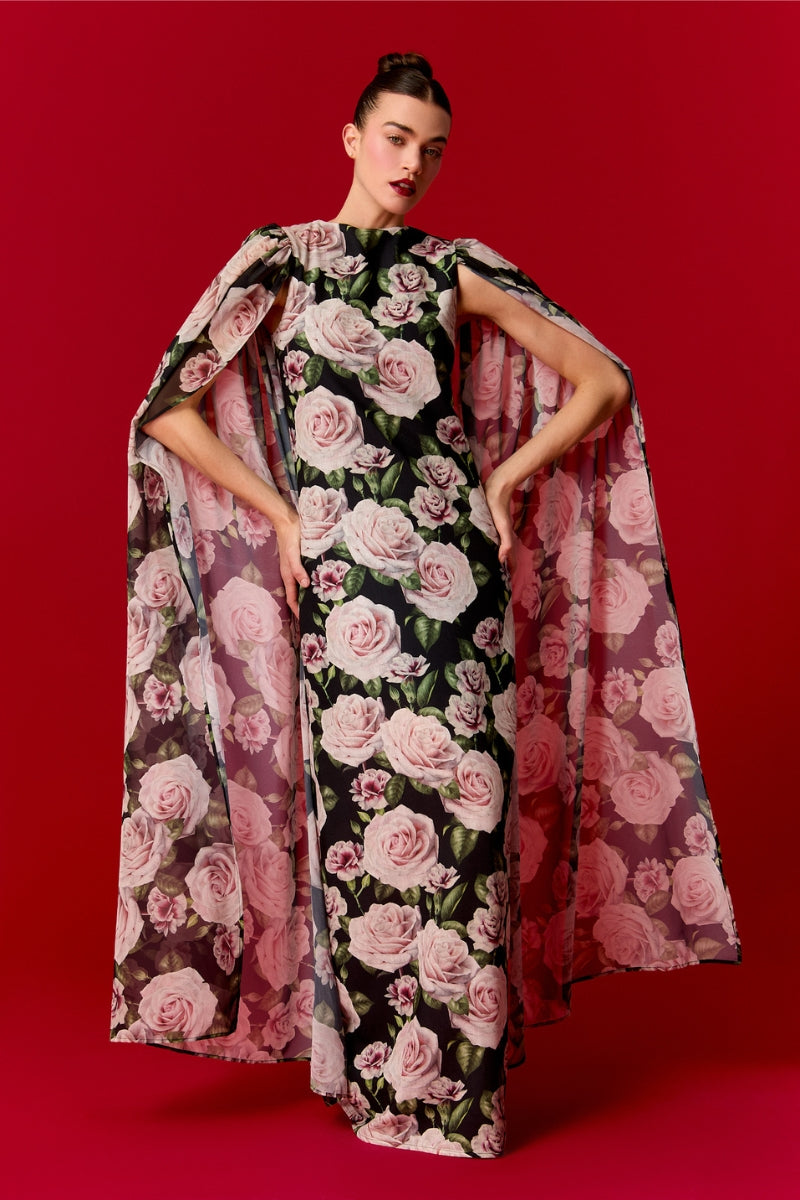 Nur Karaata Marianne maxi dress in flowing fabric with a floral pattern and sleeveless design, perfect for summer occasions.