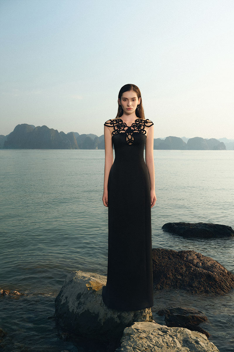 Black LYCRA Taffeta gown by Lune De Soie featuring a flowing silhouette and elegant design.