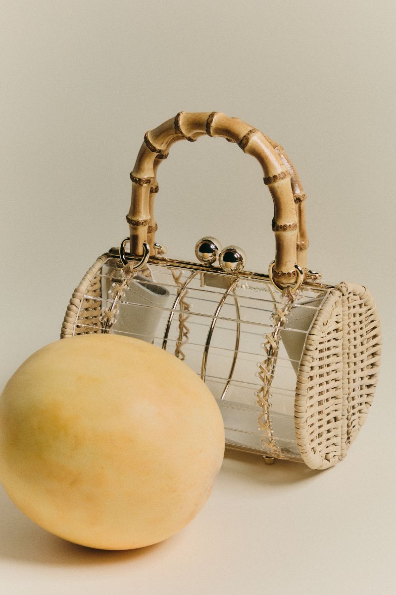 Waiwai Rio Alix Bambu Bag in Crystal, a stylish top handle bag with transparent crystal design and bamboo accents.