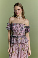 Nur Karaata Tropic Allure co-ord set featuring a matching top and pants in vibrant tropical print.