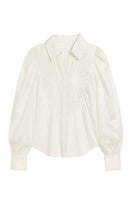 Rebecca Taylor Rachelle pop-over blouse in ivory, showcasing lightweight fabric and relaxed fit, perfect for casual or dressy outfits.