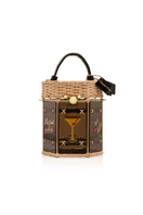 Waiwai Rio Cherry-Tini top handle bag with a sleek design and vibrant red color, featuring a structured shape and elegant handle.