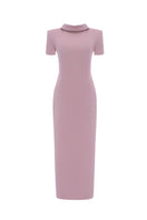 LEKIEU NIMES pink midi dress, stylish and flowy, shown hanging on a wooden hanger with a soft background.