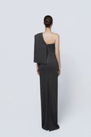 TONYY ASH DRAPE SET gown with flowing fabric and elegant design, displayed on a mannequin in a well-lit setting.