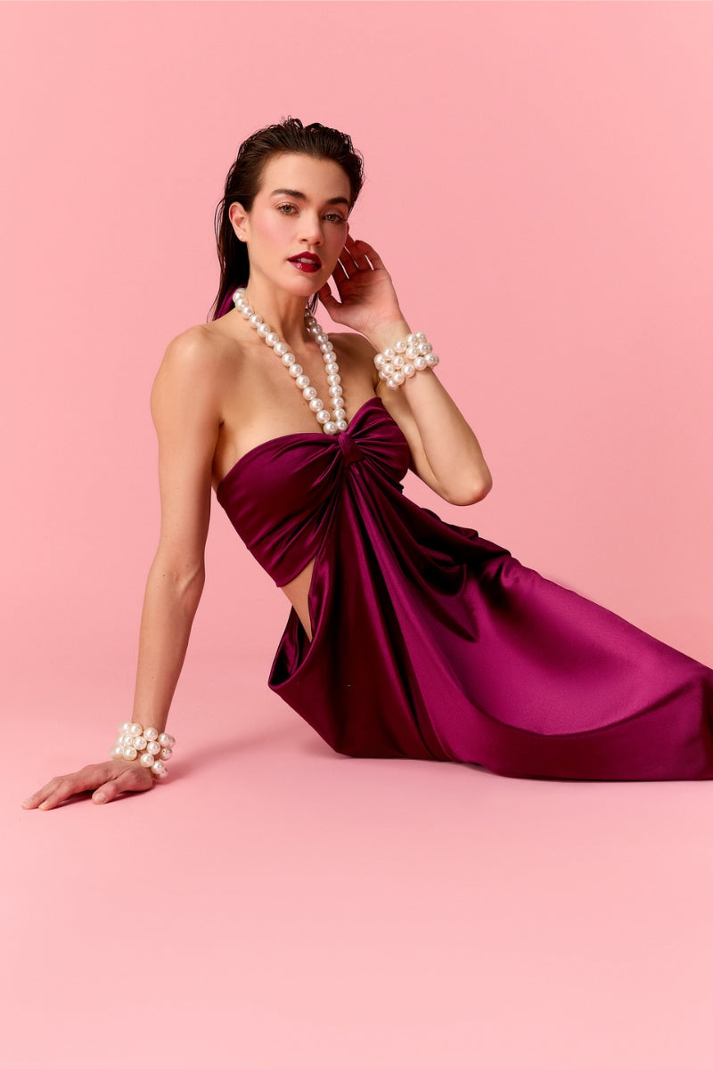 Nur Karaata Sienna Maxi Dress with flowing fabric, sleeveless design, and elegant silhouette perfect for summer occasions.