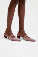 Christin Wu Sarai dusty pink velour mules, stylish heeled footwear with a soft, plush texture and sleek design.