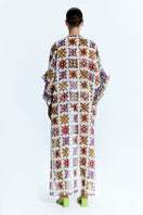 Nur Karaata JOALI SICILIA pareo dress cover-up with flowy fabric and vibrant patterns, perfect for beach or poolside wear.