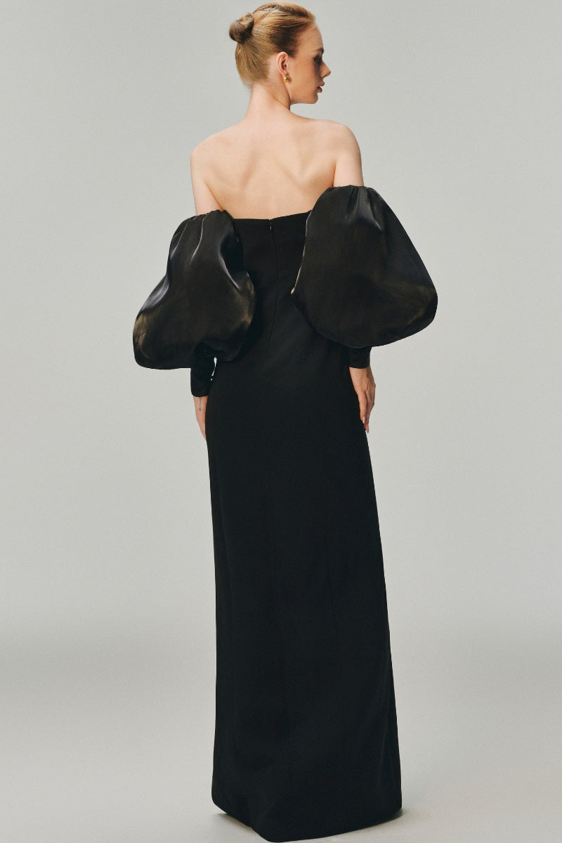 Rose's Maxi Dress by Margée Atelier features a flowy, elegant design with floral patterns and a flattering silhouette.