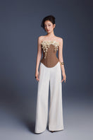 Brown bouquet corset top by Keira Tong, featuring a fitted design with floral print and adjustable straps.