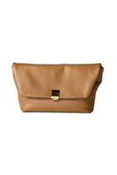 Rose de Mai FAYE clutch in caramel, stylish leather accessory with sleek design and gold-tone hardware, perfect for evening outings.