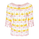 Handmade pink and yellow crochet top featuring a bird of paradise design by Andreeva, perfect for stylish summer wear.
