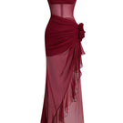 Le Thanh Hoa Flaming Muse gown featuring vibrant fiery colors and elegant flowing fabric, perfect for formal occasions.