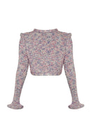Lalo Sirena pink cardigan, soft knit with long sleeves and button front, styled on a hanger against a neutral background.