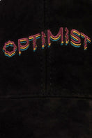 Bassigue Optimist embroidered cap, stylish hat with embroidered design, adjustable strap, casual outdoor headwear for men and women.