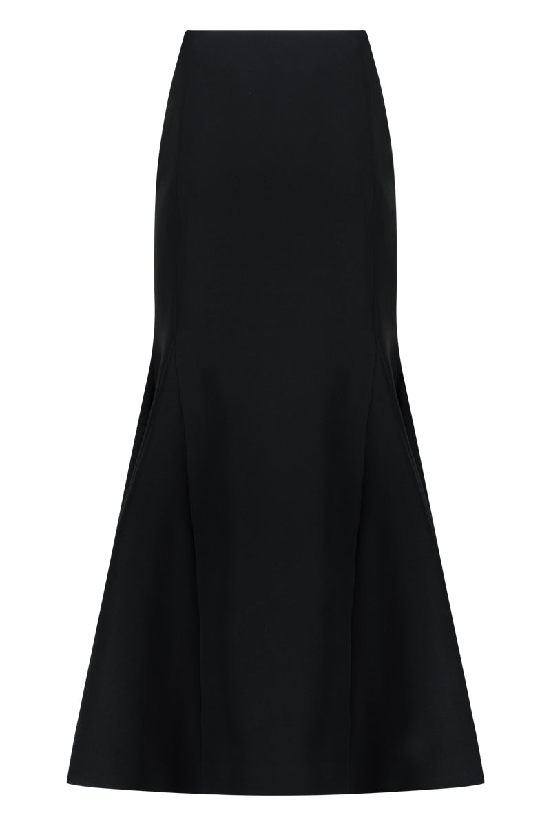 Black crepe mermaid maxi skirt by Lili Blanc featuring a fitted silhouette and elegant flowing design.