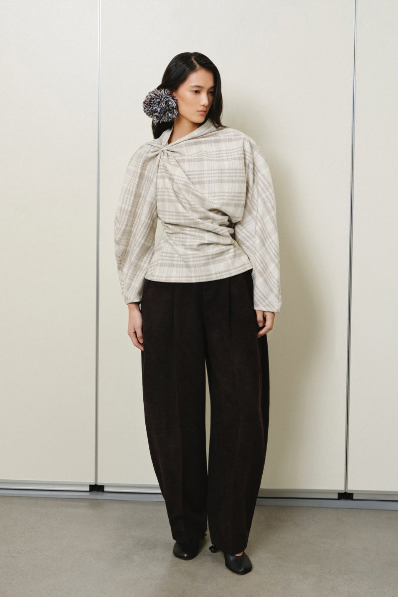 LECIA twisted plaid top featuring a stylish pattern and modern design, perfect for casual and trendy outfits.