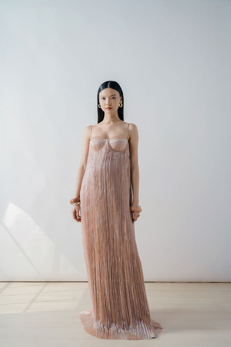 Doc Ban champagne pleated bustier column maxi dress with fitted bodice and flowing skirt, perfect for elegant occasions.