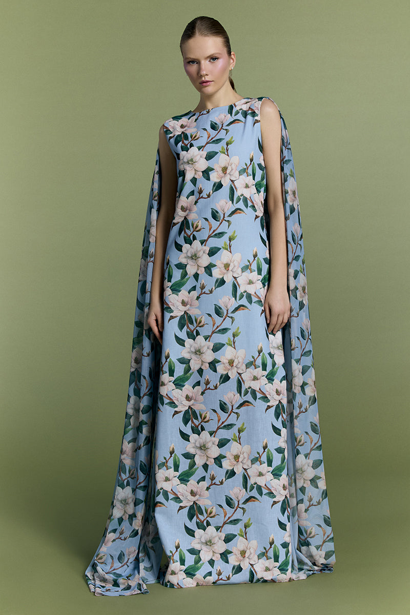 Nur Karaata Whisper Wind gown showing flowing fabric and elegant design in a soft, light-colored fabric.
