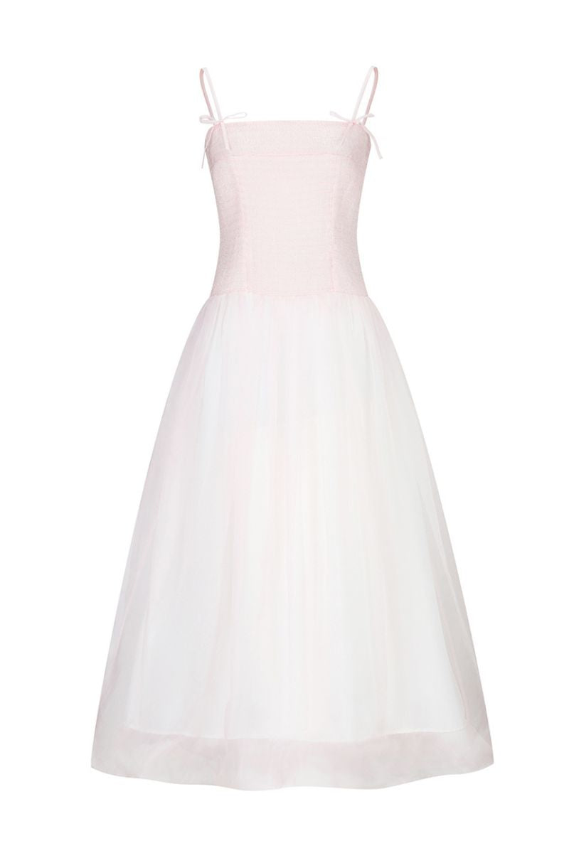 Light pink Cynthia maxi dress by Chictopia, flowing fabric with a fitted waist and elegant design, shown on a model.
