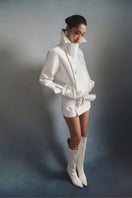 White Plan Aurora Sculpted Jacket, stylish women's jacket with a fitted design and modern silhouette, shown on a hanger.