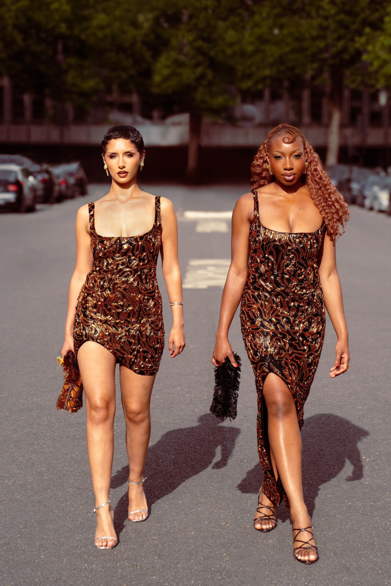 Onalaja KITA mini dress featuring a stylish, fitted silhouette with short sleeves and a vibrant pattern.