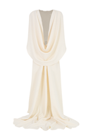 Elegant Valenciani gown with a cowl back and cape sleeves, featuring flowing fabric and sophisticated design.