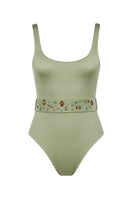 Maliluha LA MER mint one-piece swimsuit displayed on a model, featuring a sleek design and vibrant mint green color.