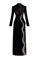 Black deep V-neck tailored sheath gown by GVLUX, featuring a fitted silhouette and elegant design for formal occasions.