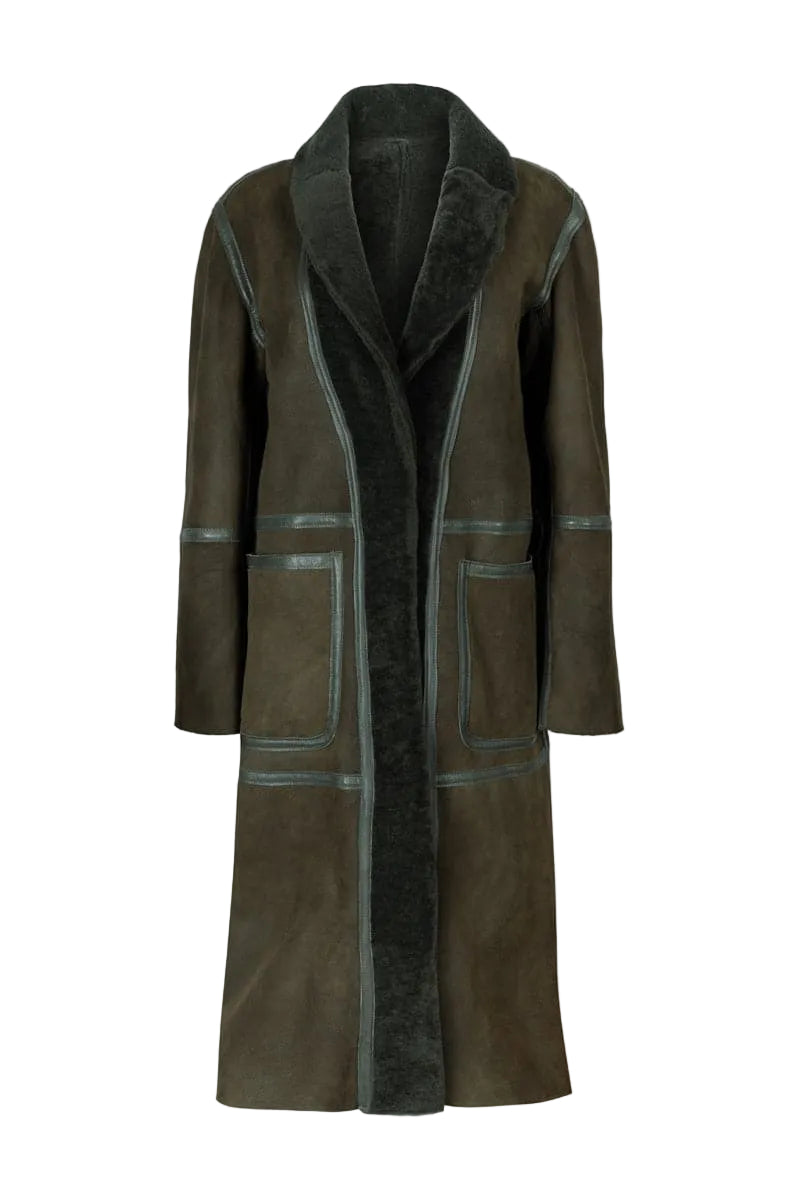 Verheyen ZINA Biker Green Shearling Coat displayed on a hanger, showcasing its stylish design and vibrant green color.