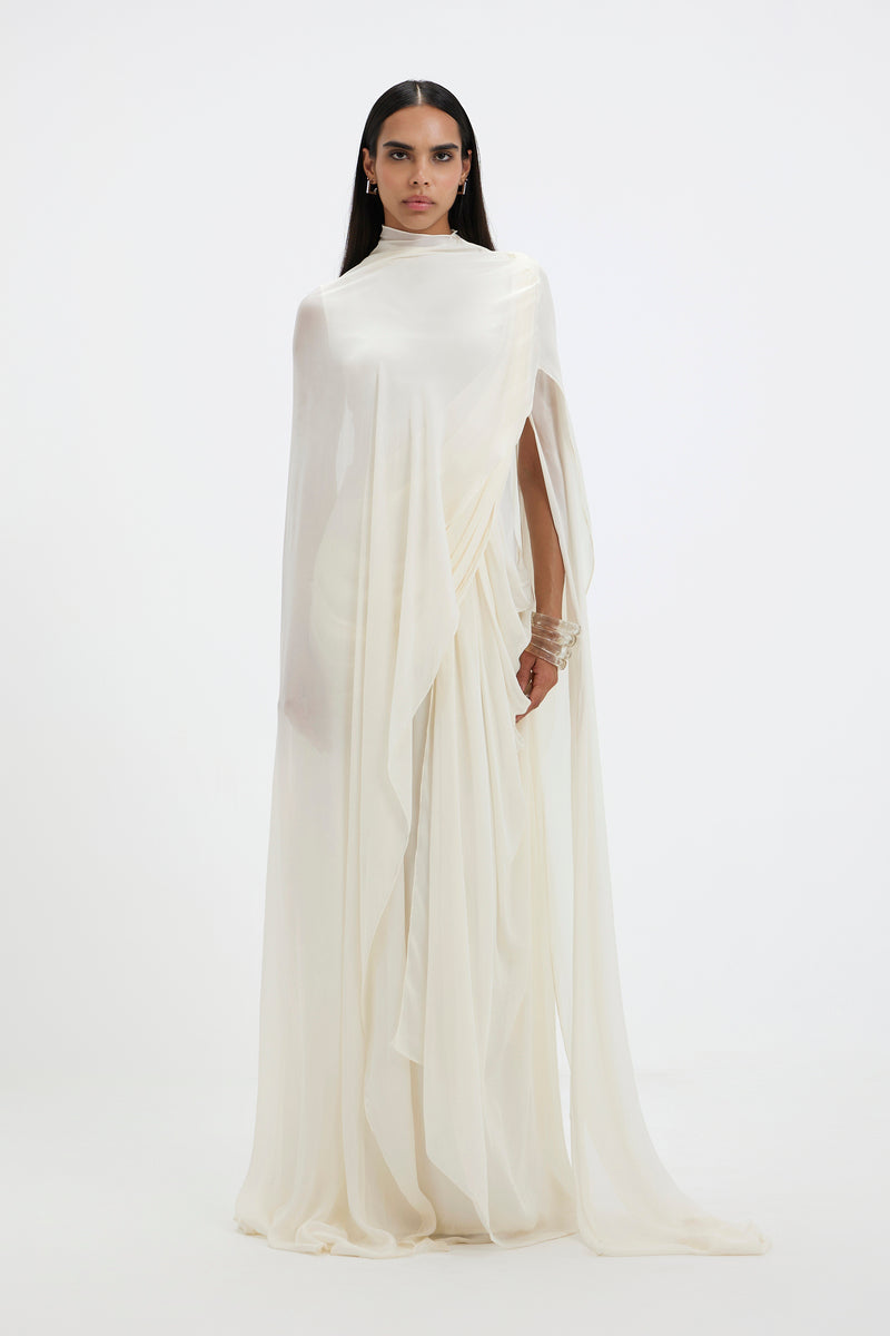 Deme By Gabriella Stacie gown displayed on a hanger, featuring elegant fabric and detailed design suitable for formal occasions.