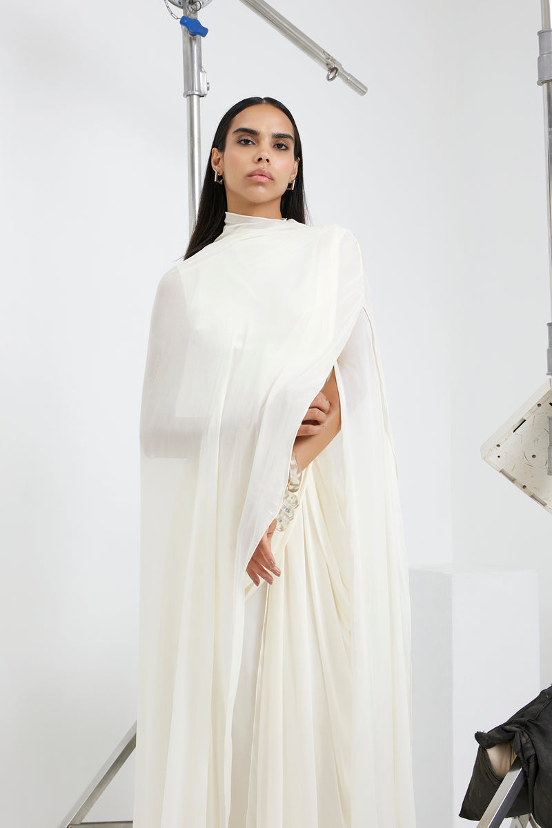 Deme by Gabriella Stacie gown featuring elegant design, flowing fabric, and intricate detailing, perfect for formal occasions.
