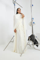 Deme By Gabriella Stacie gown displayed on a hanger, featuring elegant fabric and detailed design for formal occasions.