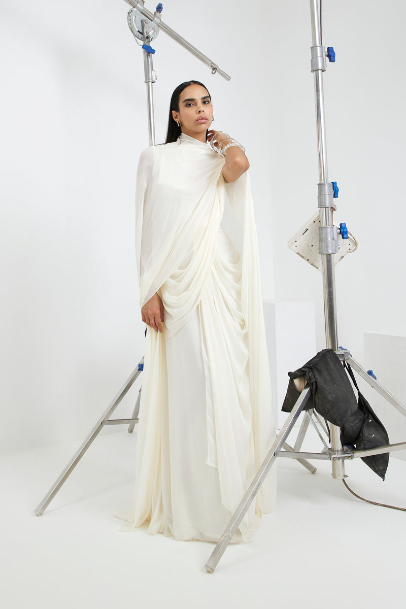 Deme By Gabriella Stacie gown displayed on a hanger, featuring elegant fabric and detailed design for formal occasions.