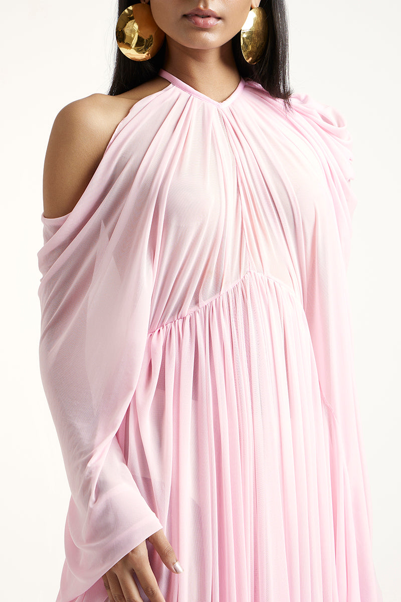 Deme By Gabriella Blossom Dress in Noa Pink, a flowy maxi dress with floral pattern and feminine silhouette.