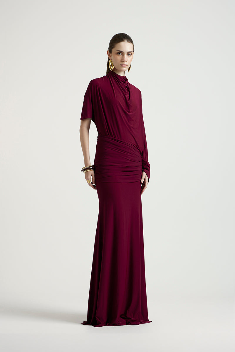 Deme By Gabriella Lorraine maxi dress in aubergine with flowing fabric and elegant design, perfect for formal occasions.