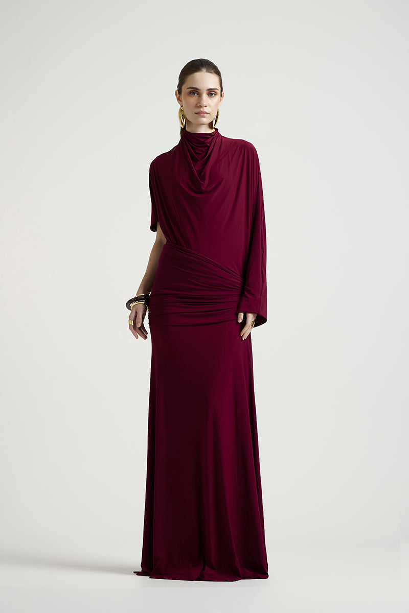 Deme By Gabriella Lorraine maxi dress in aubergine with flowing fabric and elegant design, perfect for formal occasions.