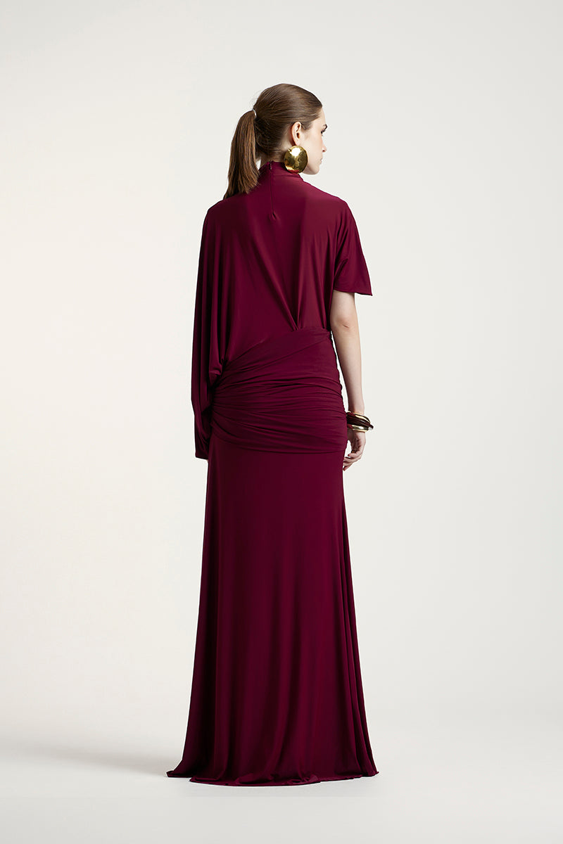 Deme By Gabriella Lorraine aubergine maxi dress with flowing fabric and elegant design, perfect for stylish occasions.