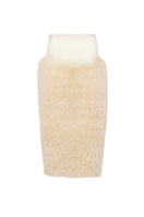 Creamy white plush skirt from Kris Marán, midi length with soft, textured fabric, styled as part of a fashionable dress ensemble.
