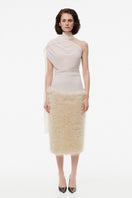 Creamy white plush midi skirt by Kris Marán, soft textured fabric, stylish and elegant for casual or dressy outfits.