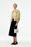 Beige cotton bomber jacket by Chictopia featuring a classic fit, ribbed cuffs, and front zipper closure in a stylish casual look.