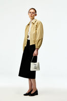 Black silk wool midi skirt by Chictopia, featuring a sleek, flowing design and a high-waisted fit.