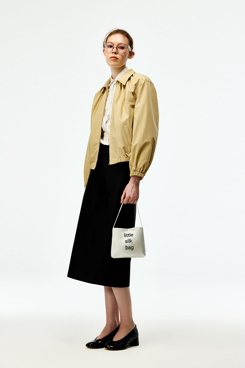 Black silk wool midi skirt by Chictopia, featuring a sleek, flowing design and a high-waisted fit.